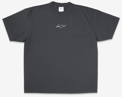 Gray t-shirt with a small white logo on a white background